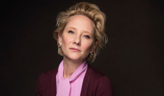 Actress Anne Heche takes a promotional portrait for the film "The Last Word" during the Sundance Film Festival in Park City, Utah, on Jan. 23, 2017.