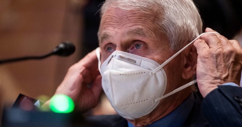 Dr. Anthony Fauci removes his mask during a Senate Appropriations Subcommittee on Labor, Health and Human Services, Education, and Related Agencies hearing on Capitol Hill in Washington, D.C., on May 17.