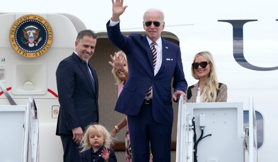 Hunter Biden, left, joined his father, step-mother, son and wife on Air Force One to fly to a week-long vacation in South Carolina.