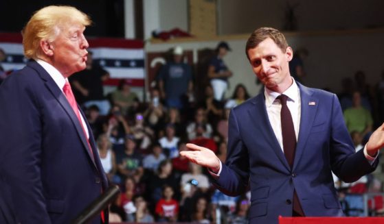 Former President Donald Trump, left, stands with Republican Senate candidate Blake Masters at a rally on July 22 in Prescott Valley, Arizona.