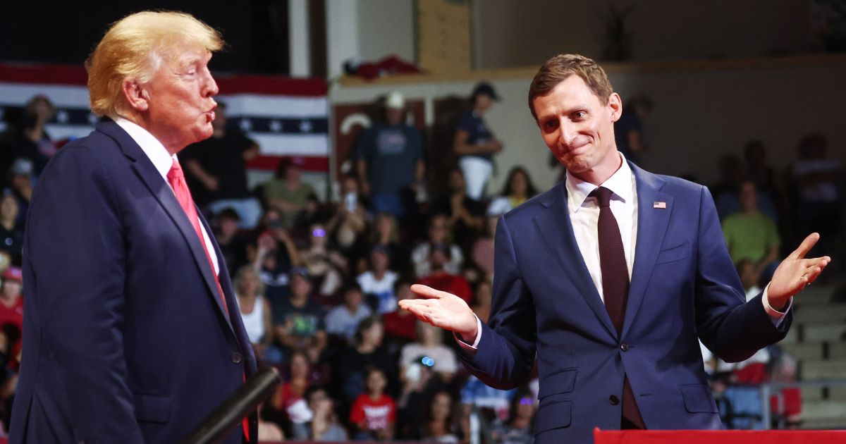 Former President Donald Trump, left, stands with Republican Senate candidate Blake Masters at a rally on July 22 in Prescott Valley, Arizona.
