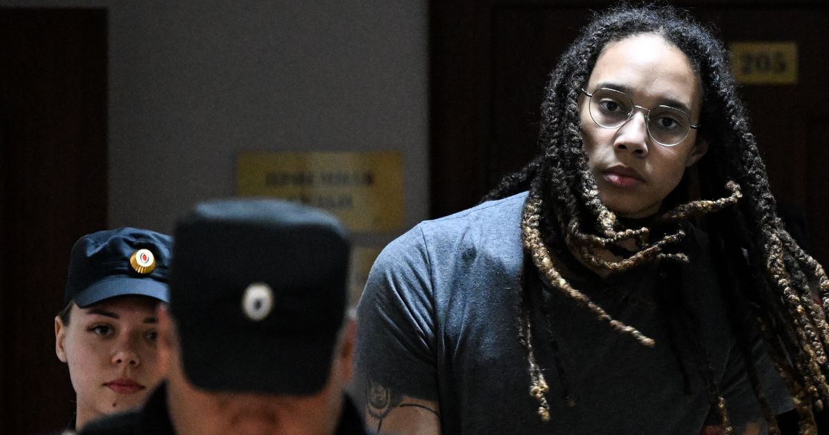 Brittney Griner is escorted to a courtroom in Khimki outside Moscow on Thursday.