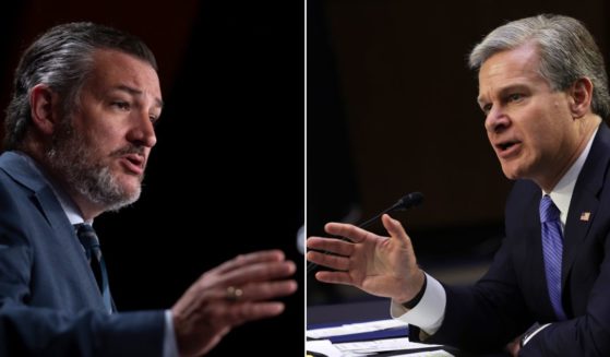 On Aug. 4, GOP Sen. Ted Cruz, left, questioned FBI Director Chrisopher Wray, right, over a leaked FBI document and speculated on the politicization of the bureau.
