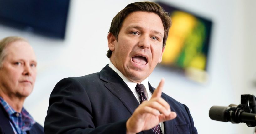 Florida Gov. Ron DeSantis speaks at a news conference on Nov. 18, 2021, after singing a new bill into law. (Chris O'Meara / AP)