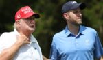 Former President Donald Trump and son Eric Trump wait together during the pro-am prior to the LIV event at Trump National Golf Club Bedminster in Bedminster, New Jersey, on July 28.
