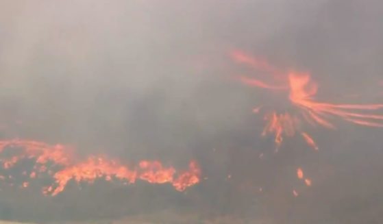 A KTLA news crew in Los Angeles County, California captured a "fire tornado" emerging from a wildfire.