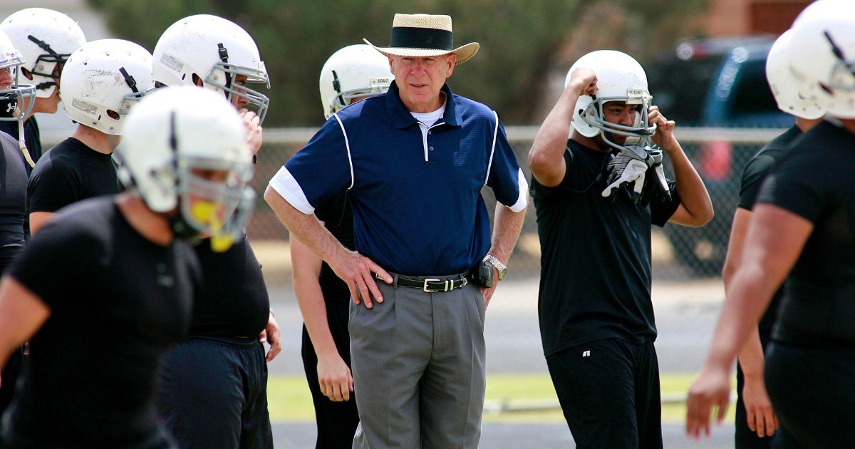 Coach Gary Gaines watches Odessa Permian football players work out in Odessa, Texas, on May 21, 2009.