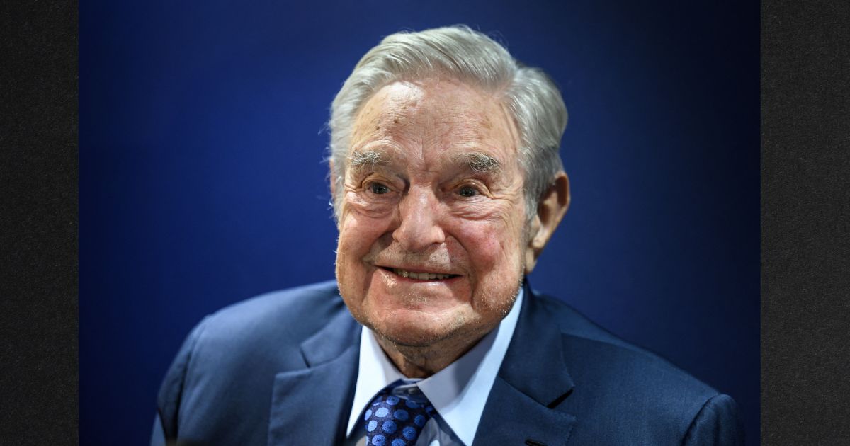 Hungarian-born billionaire George Soros smiles after delivering a speech on the sidelines of the World Economic Forum's annual meeting in Davos on May 24.
