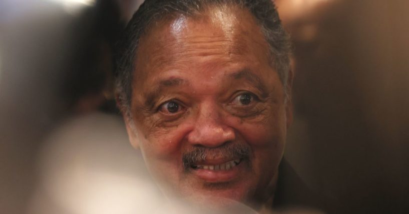 The Rev. Jesse Jackson poses for photos at the Times Square Sheraton hotel on April 6 in New York City.