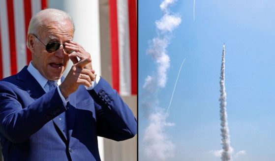 President Joe Biden attends a ceremony on the South Lawn of the White House on Tuesday in Washington, D.C. A missile is launched from a battery of Israel's Iron Dome defense system in Ashkelon in southern Israel on Saturday.