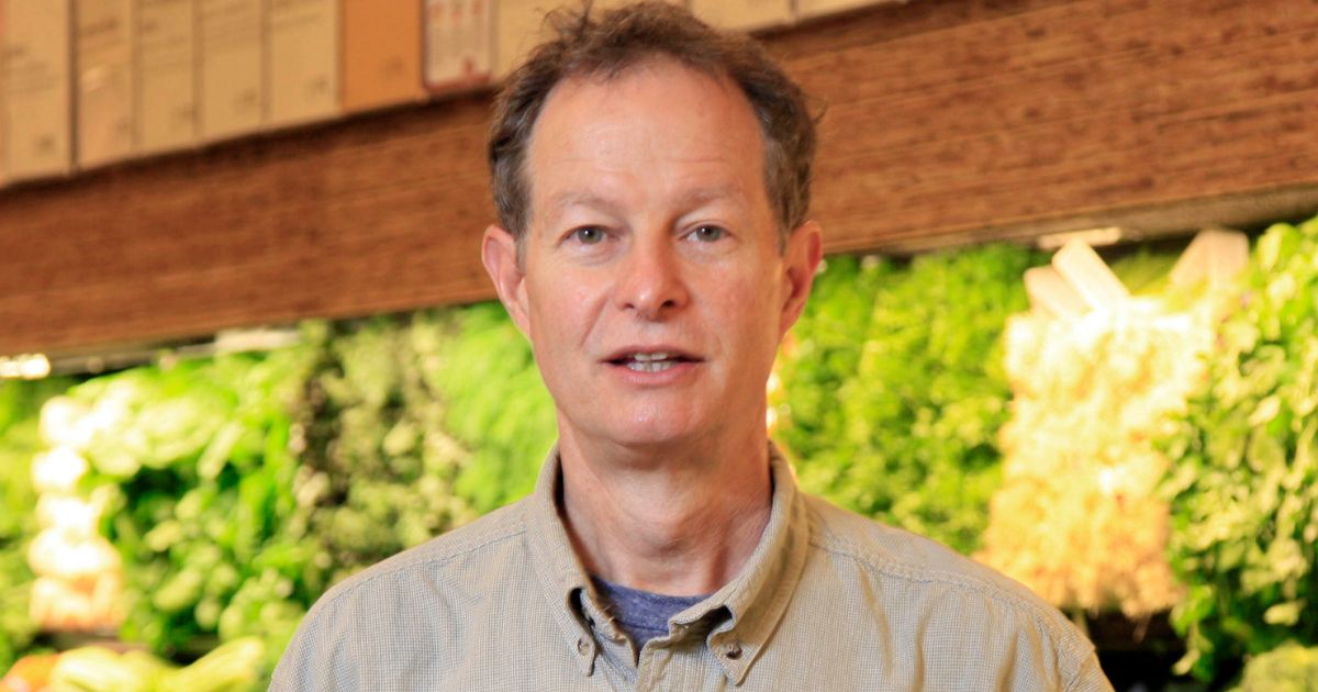 Whole Food CEO John Mackey visits one of the stores on the Upper West Side of New York City on Nov. 18, 2009.