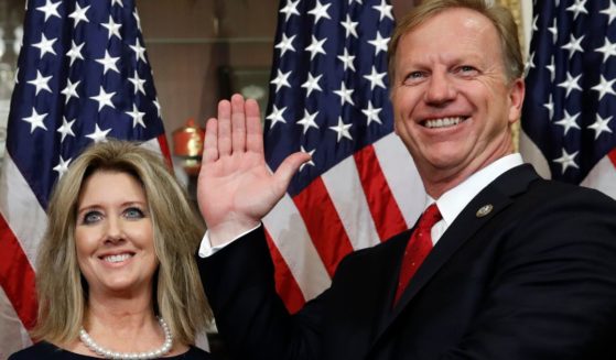 Kevin Hern, right, and his wife Tammy pose during Hern's ceremonial swearing in ceremony to the House of Representative on Capitol Hill on Nov. 13, 2018.