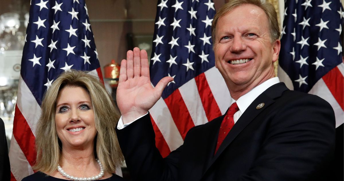 Kevin Hern, right, and his wife Tammy pose during Hern's ceremonial swearing in ceremony to the House of Representative on Capitol Hill on Nov. 13, 2018.