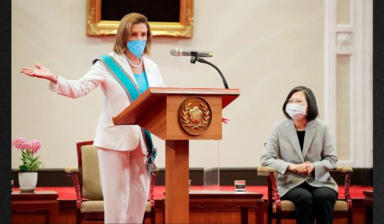 House Speaker Nancy Pelosi speaks during a meeting with Taiwanese President President Tsai Ing-wen, right, in Taipei, Taiwan, Wednesday.