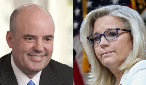 Philip J. Perry, left, is the husband of Wyoming Republican Rep. Liz Cheney, right.