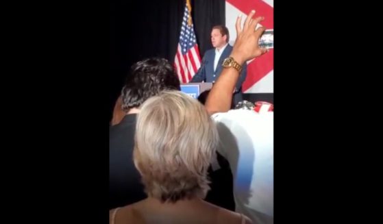 Ron DeSantis supporters broke out in "USA" chants when leftists sought to interrupt the Florida governor's Monday rally in Miami.