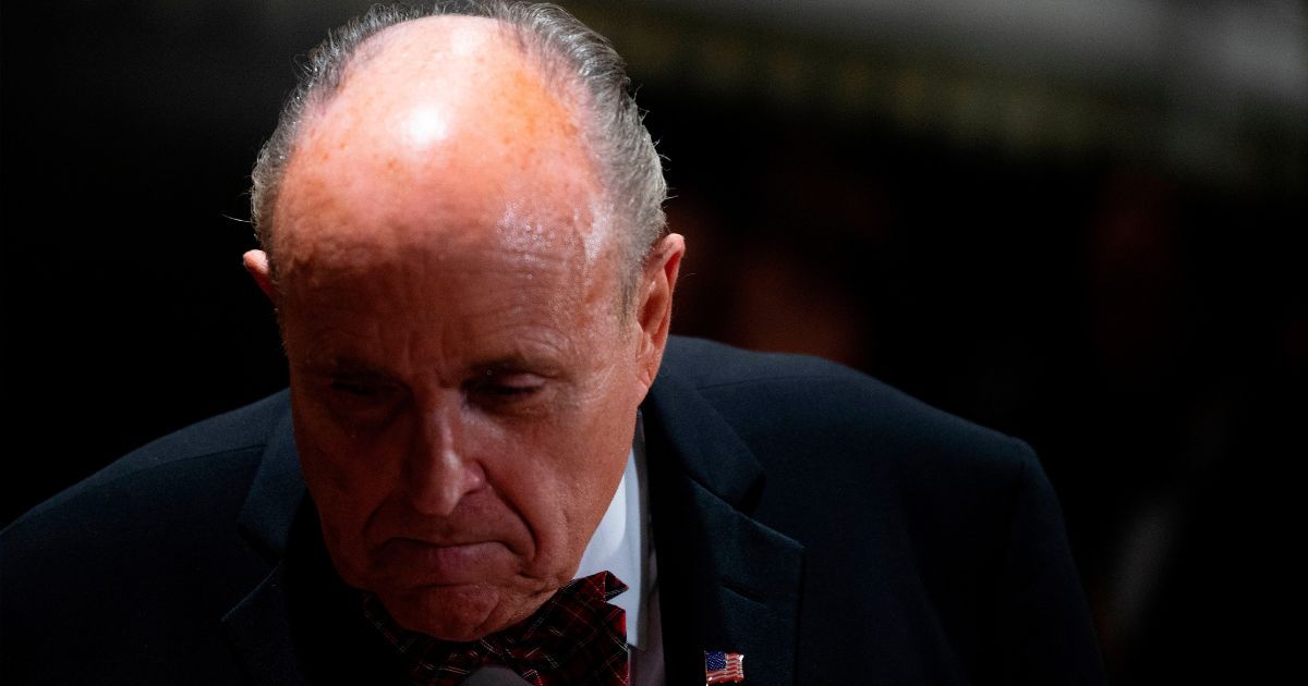 Rudy Giuliani, then-President Donald Trump's personal lawyer, arrives at Trump's Mar-a-Lago estate in Palm Beach, Florida, for a New Year's celebration on Dec. 31, 2019.