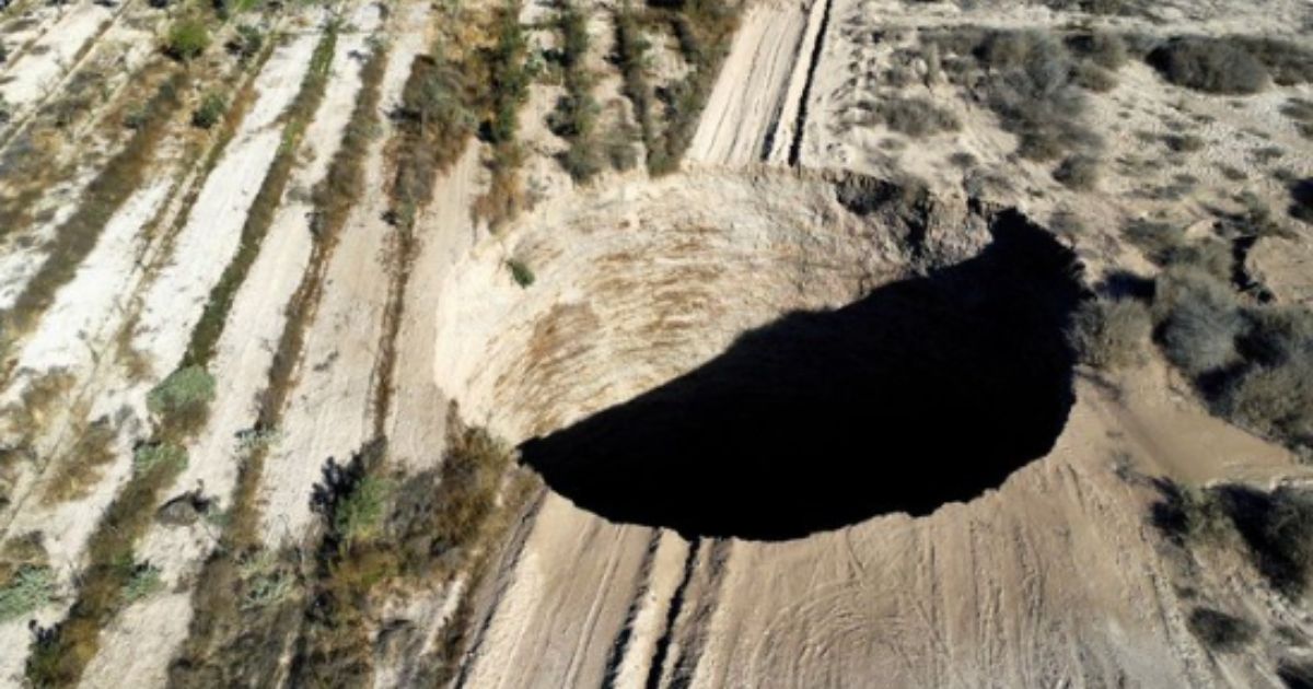 A sinkhole that opened up in Chile in July has continued to grow in recent weeks, putting the area around it at risk of further collapse.