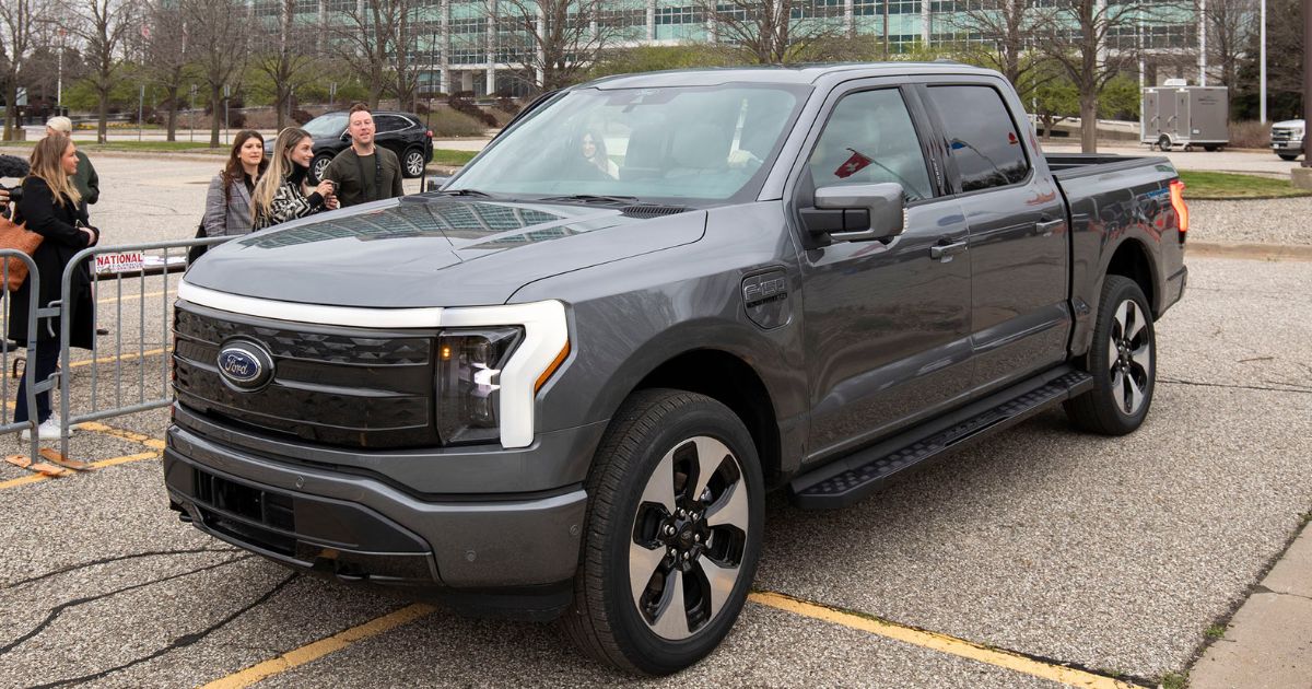 Members of the media turn out for the official launch of the Ford F-150 Lightning pickup truck at Ford headquarters in Dearborn, Michigan, in April.