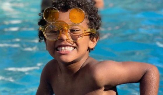 Massiah Brown, 7: "I was just playing in the pool, and then I saw a boy at the bottom of the pool. ... I went to go get him, and then I brought him up."