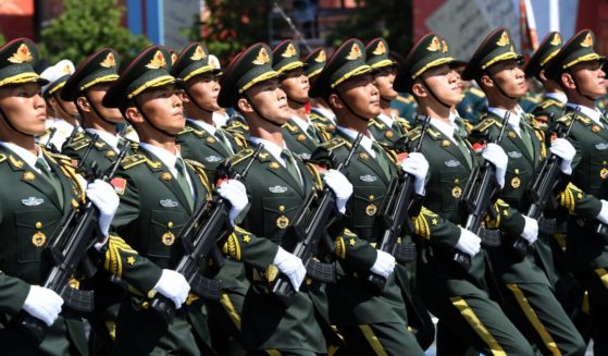 In Moscow, a parade unit of the Chinese Armed Forces marches on June 24 during the Victory Day military parade in Red Square marking the 75th anniversary of the victory in World War II.