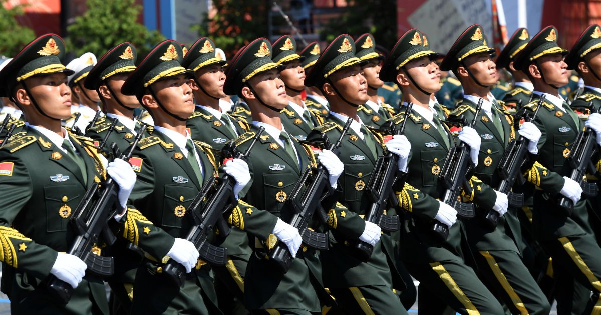 In Moscow, a parade unit of the Chinese Armed Forces marches on June 24 during the Victory Day military parade in Red Square marking the 75th anniversary of the victory in World War II.