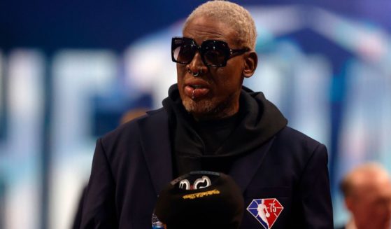 Dennis Rodman reacts after being introduced as part of the NBA's 75th Anniversary Team during the 2022 NBA All-Star Game in Cleveland in February.