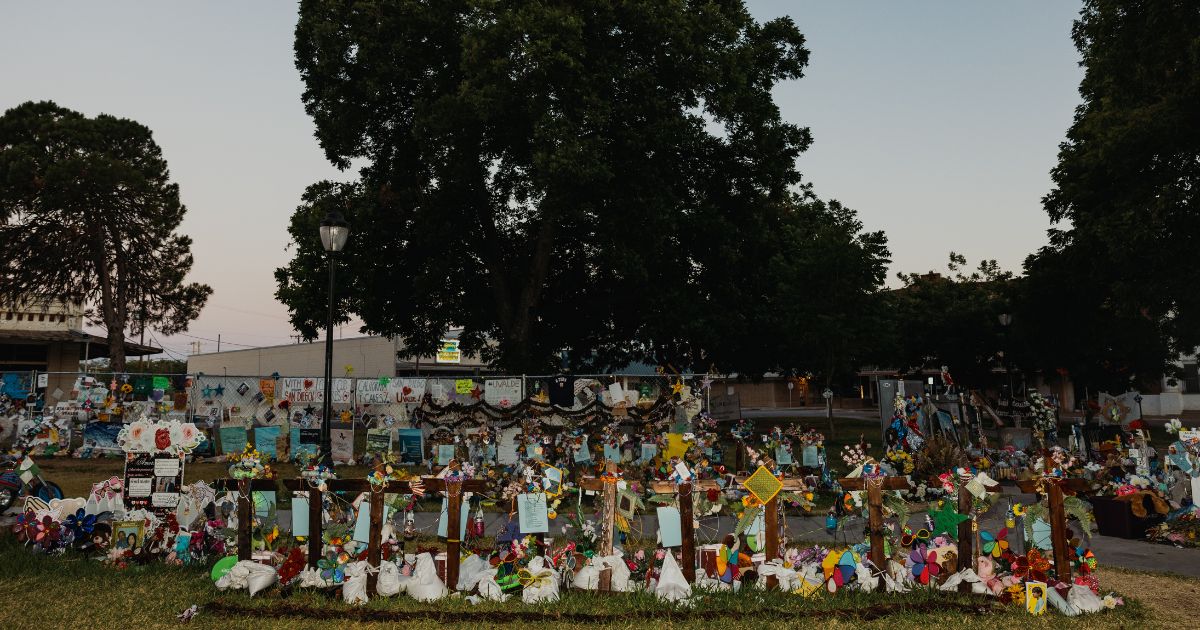 A memorial for the victims of the Robb Elementary School shooting was set up outside the school and photographed on June 25, one month after the tragic events.