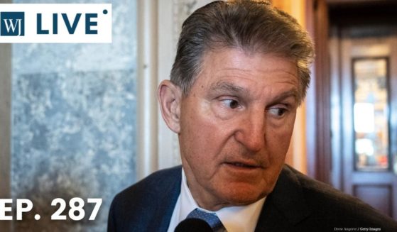 Democratic Sen. Joe Manchin of West Virginia talks to reporters about the so-called Inflation Reduction Act at the U.S. Capitol in Washington on Monday.