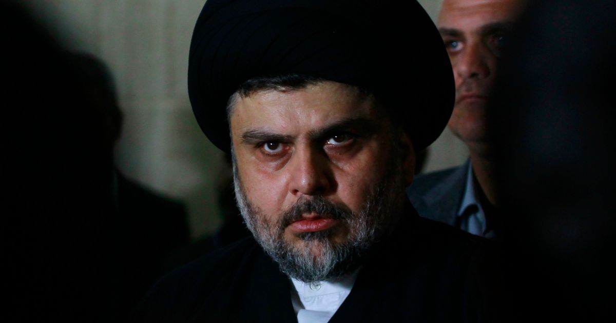Iraqi Shiite cleric Muqtada al-Sadr looks on during a meeting to discuss economic and security issues held at Iraqi Shiite Muslim leader Ammar al-Hakim's house in the southern Shiite city of Najaf on Jan. 23, 2015.