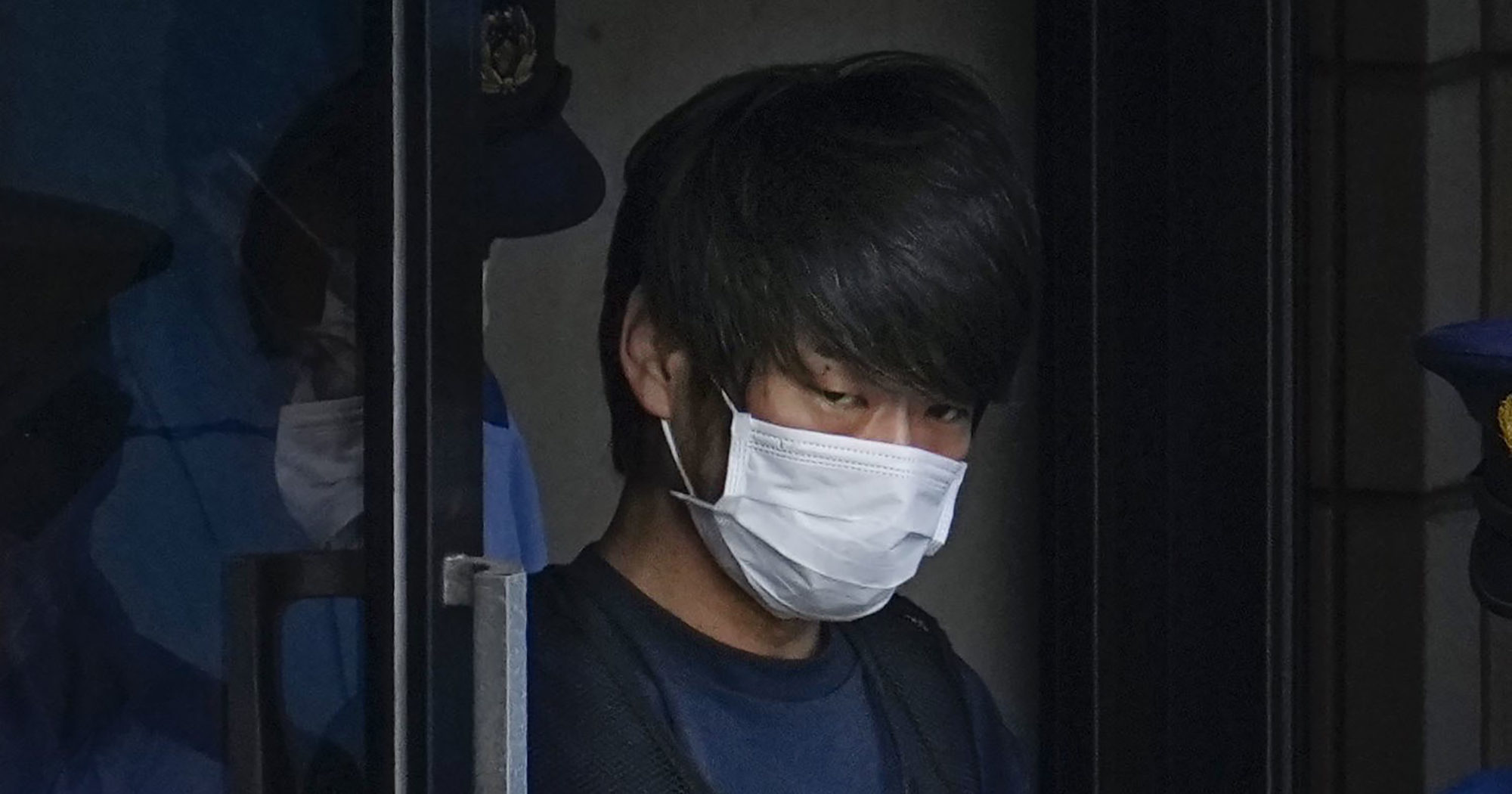 Tetsuya Yamagami, the alleged assassin of former Japanese Prime Minister Shinzo Abe, leaves a police station in Nara, western Japan, on July 10.