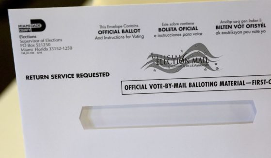 A vote-by-mail ballot envelope is shown to the media at the Miami-Dade Election Department headquarters on July 21 in Miami.