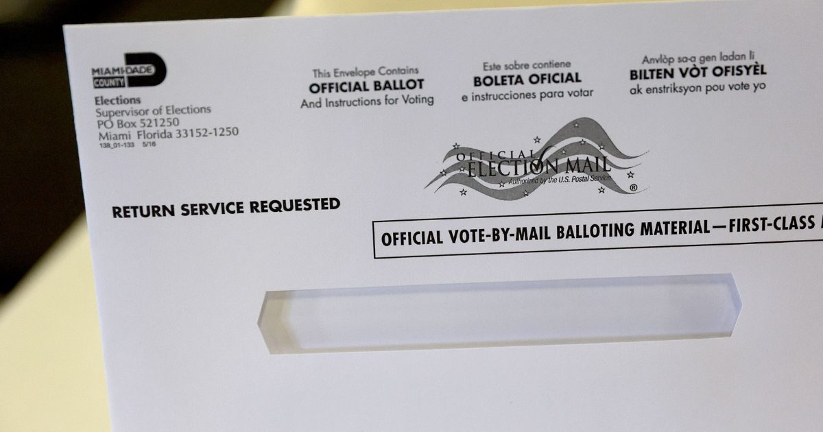 A vote-by-mail ballot envelope is shown to the media at the Miami-Dade Election Department headquarters on July 21 in Miami.