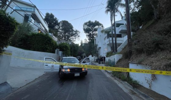A robbery almost occurred in Los Angeles early Wednesday morning, but an armed resident who did not take kindly to the break-in decided to fight back.
