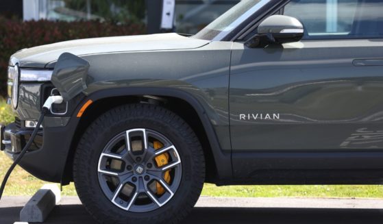 A Rivian electric pickup truck sits in a parking lot on May 9 in South San Francisco, California.