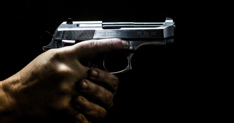A man holds a gun in Sao Goncalo, Rio de Janeiro, Brazil, on Sept. 3, 2018.