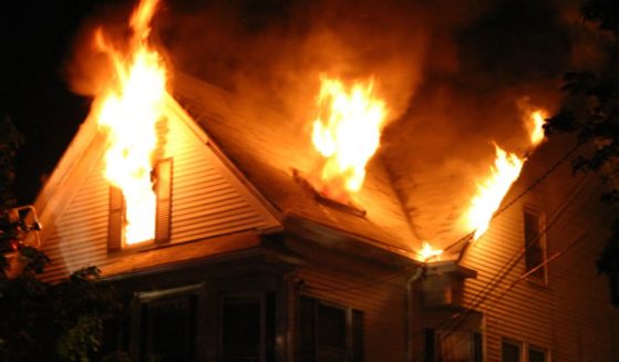 A family home is on fire during the night.