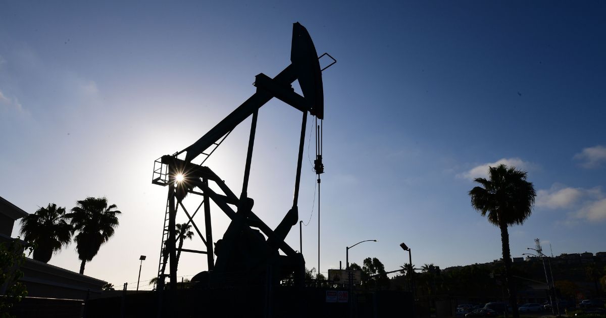 An oil pumpjack operates in Signal Hill, south of Los Angeles, on April 21, 2020.