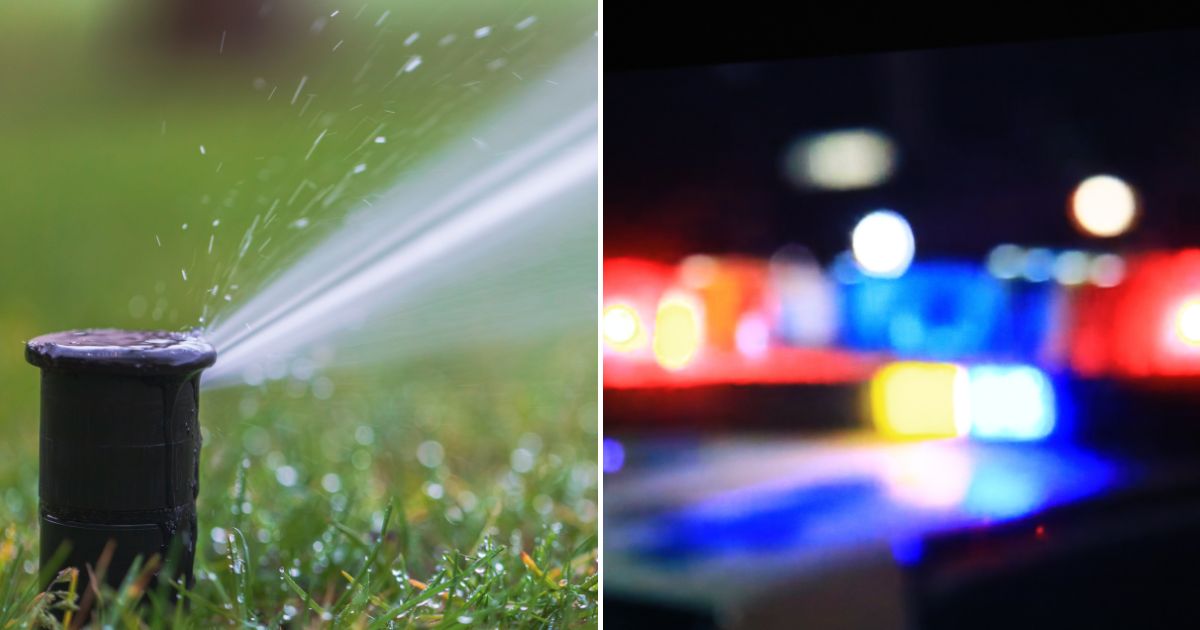 a lawn sprinkler head and police car lights at night
