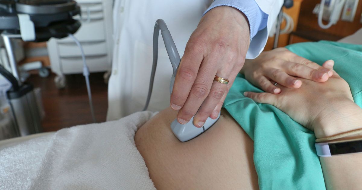 A Chicago doctor performs an ultrasound on a pregnant woman on August 7, 2018.