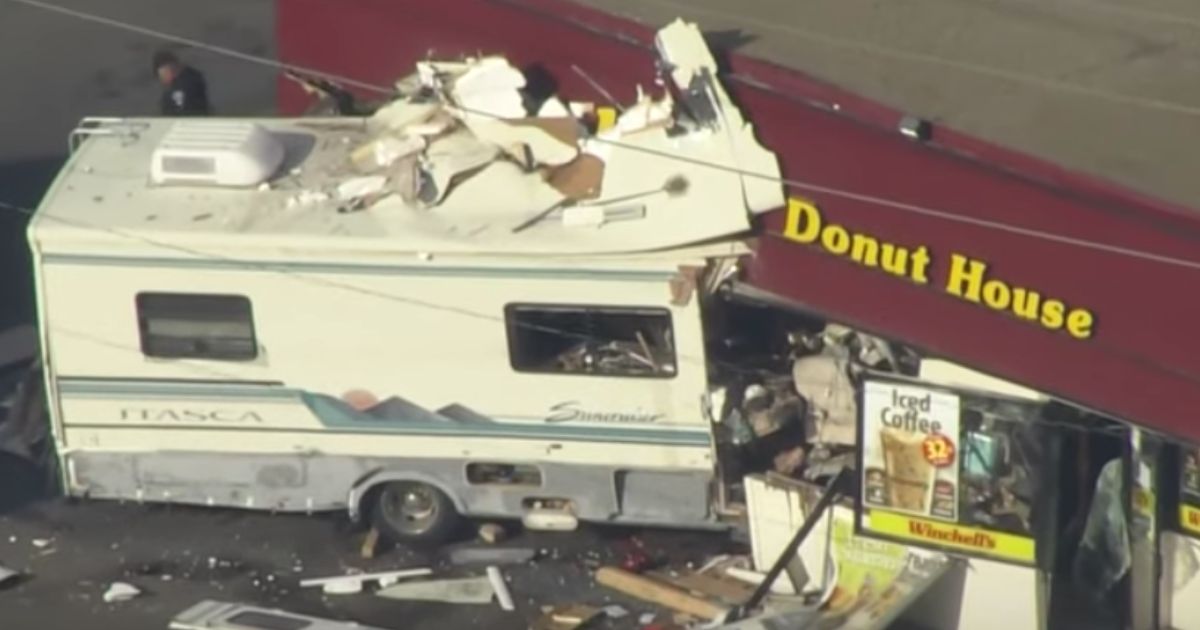 An RV crashes into a doughnut shop in Lakewood, Colorado, on Monday.