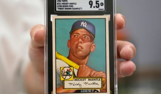 A Mickey Mantle baseball card is displayed at Heritage Auctions in Dallas, on July 21.