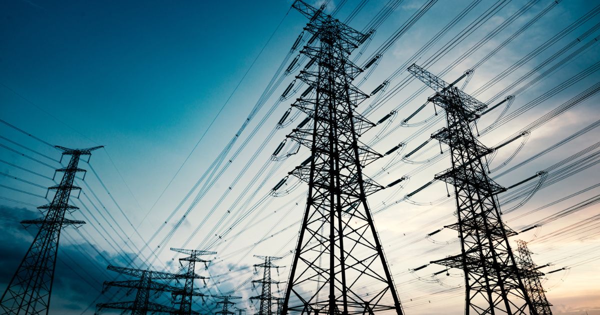 Electrical towers are seen in the above stock image.