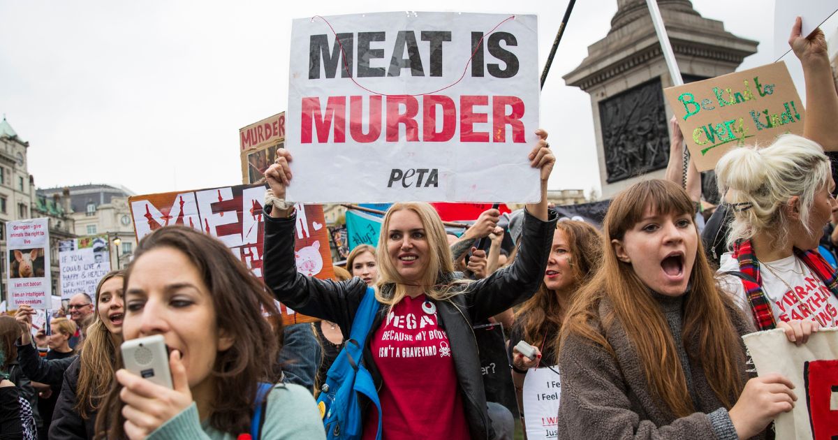 Protesters carry banners during an animal rights march on Oct. 29, 2016, in London.