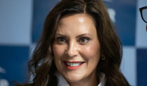 Michigan Governor Gretchen Whitmer poses for photos with volunteers after speaking at a canvass kickoffs event on Michigan Primary Election Day on Aug. 2 in Grand Rapids, Michigan.