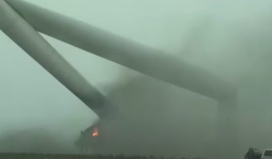 A wind turbine was bent and caught on fire after a storm on Tuesday in Custer County, Oklahoma.