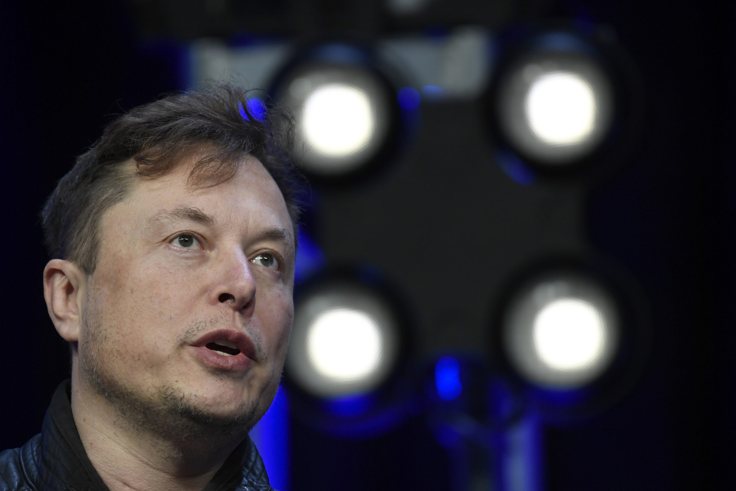 Tesla CEO Elon Musk speaks at a conference in Washington, D.C., on March 9. Musk and representatives of social media giant Twitter are due in court in October for a trial that will decide whether the world's richest man will be forced to complete his agreed-to $44 billion acquisition of Twitter.