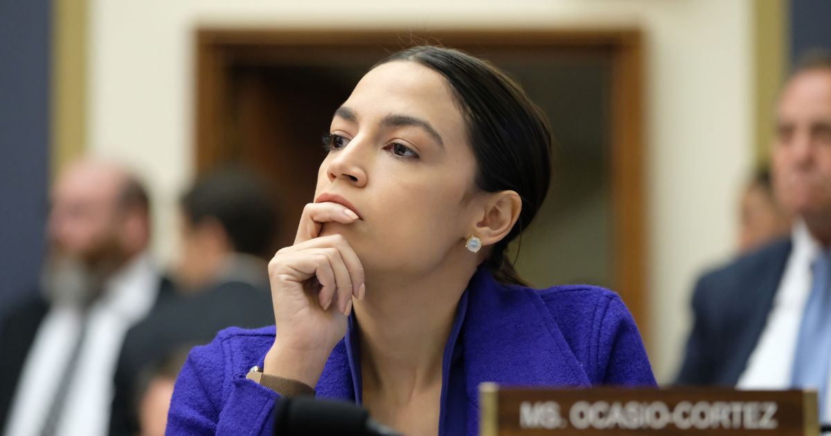 Rep. Alexandria Ocasio-Cortez listens during a House Financial Services Committee hearing on April 10, 2019, in Washington, D.C.