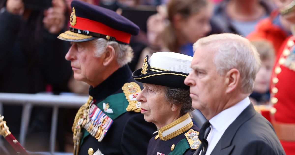 King Charles III, left, Princess Anne, middle, and Prince Andrew, right, walk behind Queen Elizabeth II's coffin in Edinburgh, Scotland, on Monday.