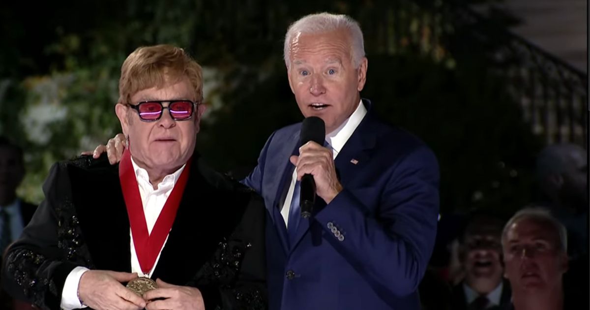 Sir Elton John receives the National Humanities Medal from President Joe Biden on Friday.